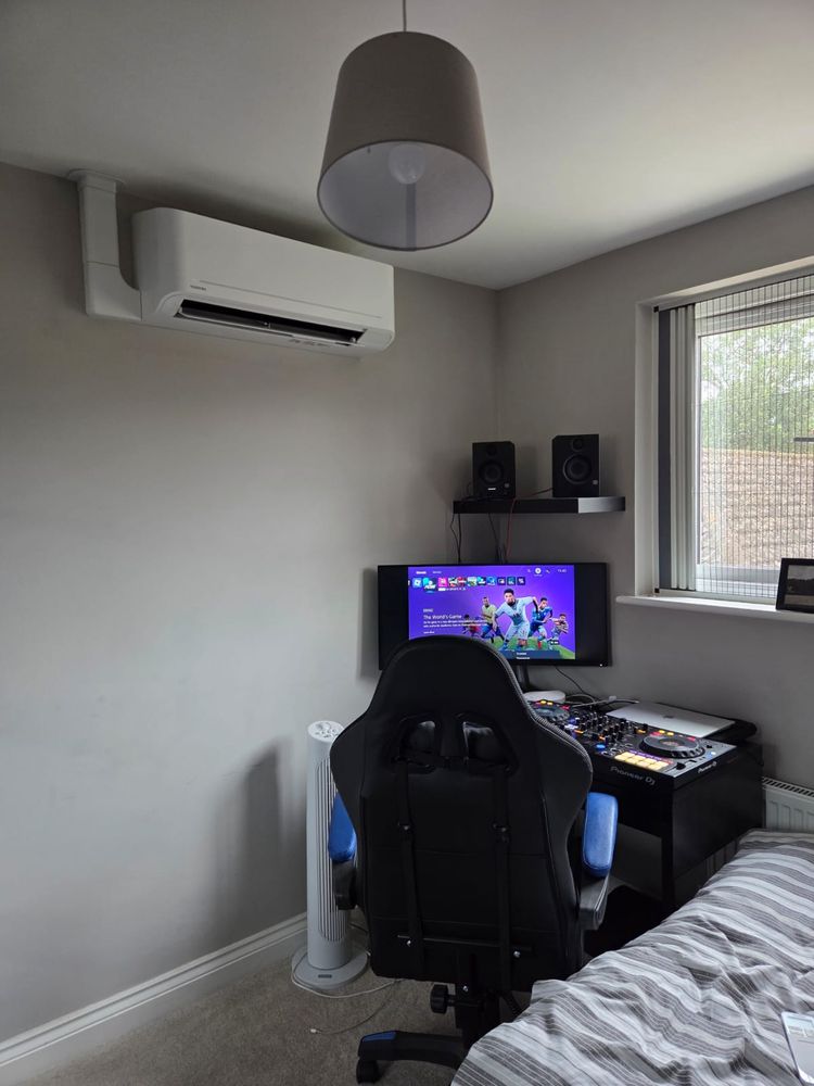 Indoor unit in a bedroom used as a home office